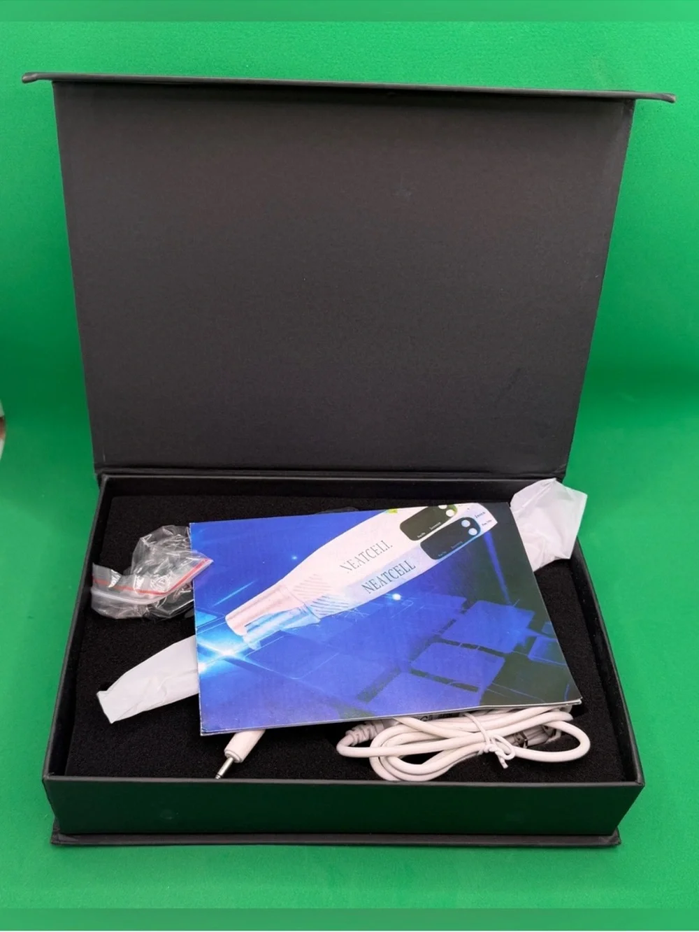 NEATECH White Handheld Device in White